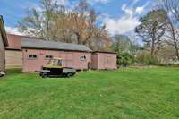 The two storage buildings will remain with the property. Both have electricity.