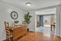 Eating area/Kitchen leads into the dining room/sunroom area.