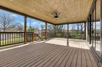 A glimmering, hand-finished wood ceiling sets the tone for this outdoor paradise, the perfect space to sip coffee in the morning & cocktails in the afternoon. An oversized ceiling fan keeps the space cool, & there is room enough for outdoor dining.