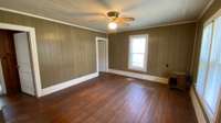 The inside of this two bedroom home features real hardwood floor and pine tongue and groove bead board ceilings for a classic look.