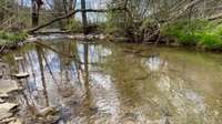 The north creek is called Bates Branch and the west creek is Rock Springs Branch.