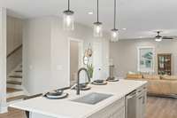 Unit 109 Charlotte Everly Circle features dark cabinets.
