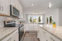 Large Kitchen w/granite countertops and island