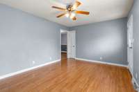 Spacious Living Room with Wood Flooring & a Ceiling Fan!!