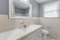 Guest Bathroom Has a Large Guest Vanity With Lots of Space, a Linen Closet & Tub/Shower!