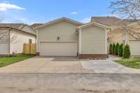 3 car tandem garage; also note the extra parking pad for a small car or golf cart