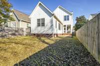 Another view of the back lawn. Privacy and maintainable all within the bustling Green Hills area!