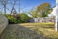 The 6' privacy fence surrounds the home and backlawn providing plenty of outdoor play area for family pets and children!