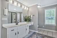 Ensuite Bathroom with vanity and makeup sitting area