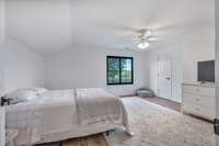 Bedroom 1 on 2nd floor with large walk-in closet with built-in shelving