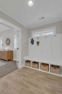 Mudroom area as you enter from the garage - the perfect drop zone!