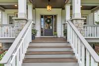 The fantastic front porch greets you - a timeless traditional feel! This beautiful home sits about 75ft from the street with a sizable front and rear yard