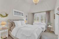 One of the three upstairs bedrooms - this bedroom features a large en suite bathroom