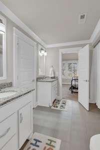 Expansive bathroom situated between two of the second floor bedrooms