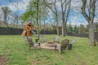 You do not want to miss this backyard! Plenty of space to enjoy with a private and park like setting from the back of the home to the fence is about 175 feet!