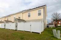 Rear of Unit. Gate opens to common area between units.