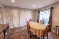 Small door on left is Pantry and the right doors are the Washer/Dryer and storage.