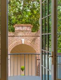 Here is a peek at the beautiful garden structure on the terrace from the master bedroom. Notice the antique terracotta pieces on the top and the beautiful cove for the antique planter.