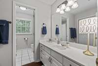 Bathroom for upstairs.  Tiled floors and separate area for tub/shower and sink!