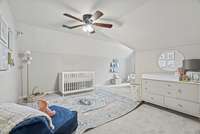 Notice the spaciousness of this upstairs bedroom!