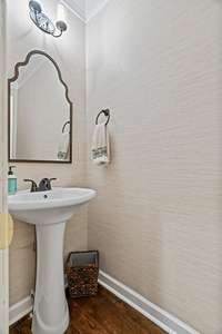 Powder room located on the main level for guests.