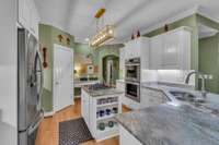 Spacious kitchen with gas range in the island and double ovens for big meals and entertaining!