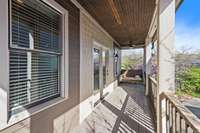 Enjoy your morning coffee or glass of wine on this rocking swing porch.