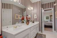 Double marble top Vanity, , tiled floors, and premier Lighting