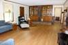 View of Living Room towards the awesome built-in bookcases & cabinetry!