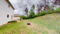 Another view of your private back yard, complete with a fire pit to enjoy on cool nights