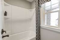 Jack and Jill bathrooms upstairs. Tiled shower available.