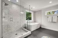 Seamless glass shower and soaking tub.