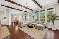 Cozy den off of the kitchen with fireplace and built-ins.