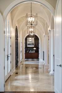 At one end of the grand arched foyer you'll find an office...