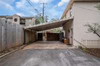 Carport has storage as well as access to the enclosed yard and terrace