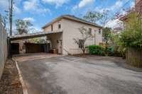 Carport w alley access the HOA has approved building a garage if you choose