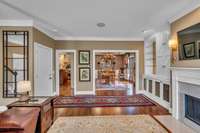 Your view into the Kitchen and Dining Room w the adjoining side terrace and yard