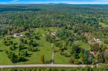 The perfect property to own with over 40 wooded acres behind the property, loaded with trails, wildlife and plenty of options for all kinds of fun!