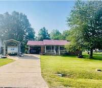 91 Quail Acres, 0.5 Acres, Double Carport with additional RV Carport, Country Living near Town, One Entrances, Dead End Coves, Use of Community Pond, Generac Generator included.