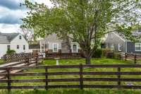 This 1950's bungalow has a beautiful front and back yard with mature trees and it is fully fenced.