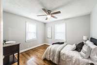 Here is the downstairs bedroom and it also has the hardwood flooring.