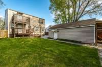 Here you can see all the back yard space as well. You'll notice the garage has a pedestrian door as well.