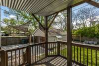 This deck overlooks the back yard. It is a great place for relaxing or entertaining.