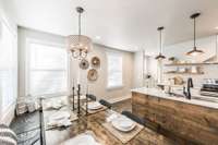 There is room for everyone at this table and all the wood details really warm up the space with the perfect contrast.