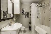 This is one of the 2 bathrooms upstairs. It has such style and character!