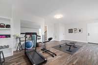 Currently this room is being used as a home gym, but would be an excellent additional office or living quarters as it includes a closet and private bathroom.