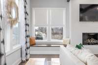 A built-in window seat is perfect for additional seating when entertaining, or for lazy afternoons with a great book!