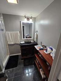 Attached In-Law Studio with full bath and separate entrance ($700)