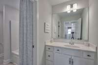 Jack and Jill Style Bath 2 Photo of Model Home, Color Selections & Finishes will Vary.