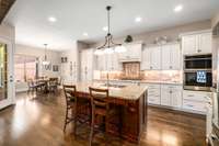 Large kitchen with huge hidden walk in pantry.